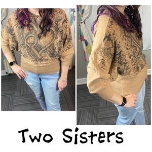 Tan batwing knit sweater with studs snakeskin